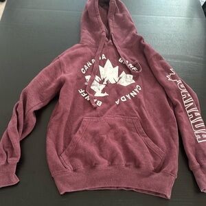 Banff, Canada sweater women’s size small dark red/ Burgundy.
